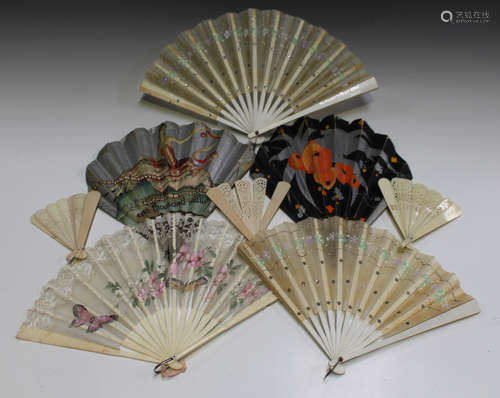 A group of three early 20th century fabric purses with gilt metal clasps, one inset with coloured