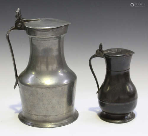 A late 19th century pewter tappit-lidded flagon with twin acorn thumbpiece, height 26cm, together