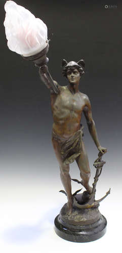 A late 19th century figural spelter table lamp in the form of Mercury holding a frosted glass