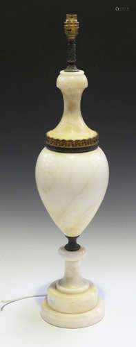 An early 20th century alabaster table lamp of ovoid form with gilt metal mounts, height 70cm.