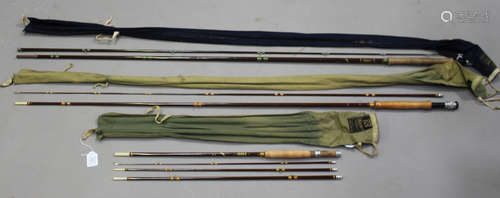 A group of nine fishing rods, including a Hardy's Smuggler 8' four-piece fibreglass rod, a Hardy's