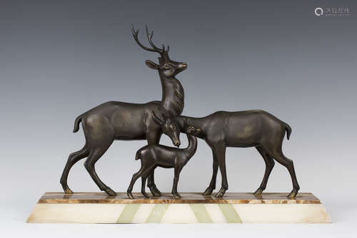 Rochard - an Art Deco patinated cast spelter model group, depicting a family of deer, all standing