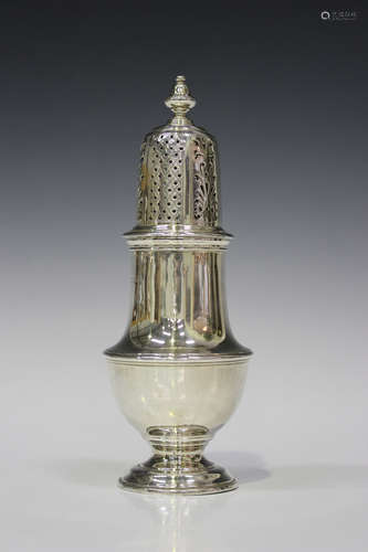 A George V silver sugar caster of baluster form with pierced dome cover, London 1928 by Goldsmiths &