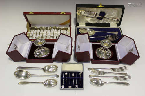 A small group of silver and plated items, including a set of six sterling toothpicks, each with a