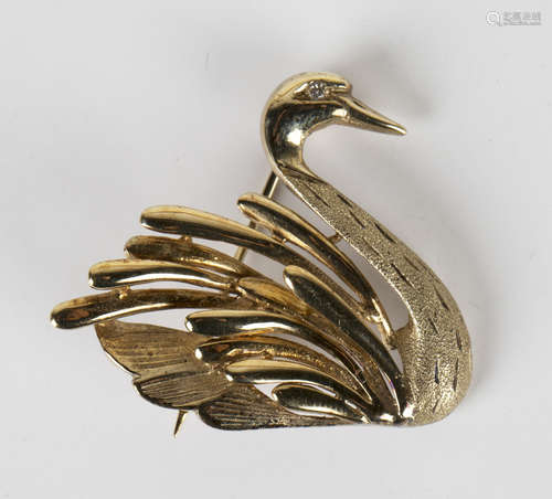 A 9ct gold and diamond brooch, designed as a swan, mounted with a circular cut diamond to the eye,