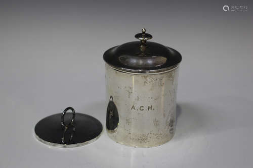 A late Victorian silver tobacco jar and cover with original silver mounted damper, of cylindrical