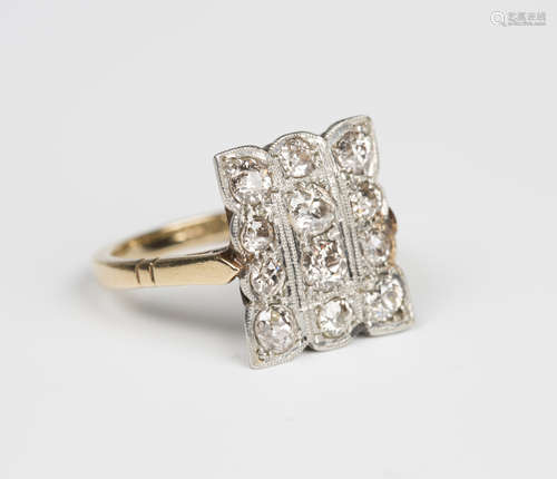 A gold and diamond panel shaped rectangular cluster ring, mounted with twelve cushion cut