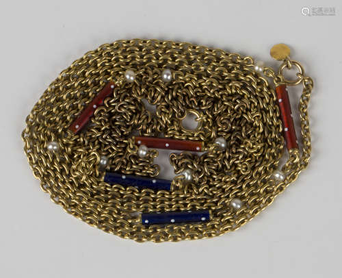 A gold, seed pearl and enamelled long chain, spaced with red and blue enamelled baton shaped links