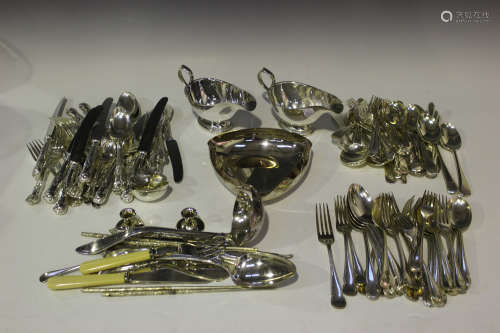 A collection of mostly silver and plated flatware, including a Dutch .833 silver cake slice, pierced