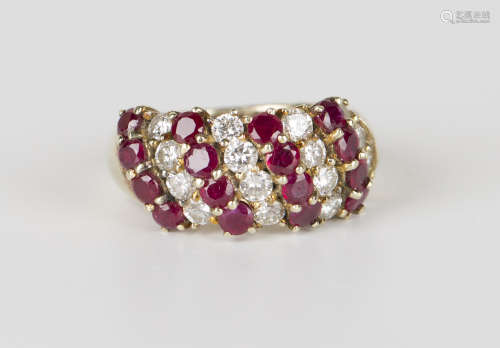 A gold, ruby and diamond ring, claw set with four rows of four circular cut rubies alternating