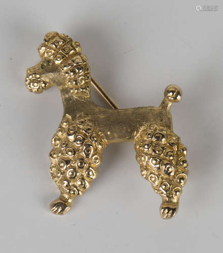 A 9ct gold brooch, modelled as a standing poodle, London 1963, width 2.7cm.Buyer’s Premium 29.4% (