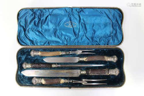 A late 19th century plate mounted stag antler handled five-piece carving set, comprising two knives,