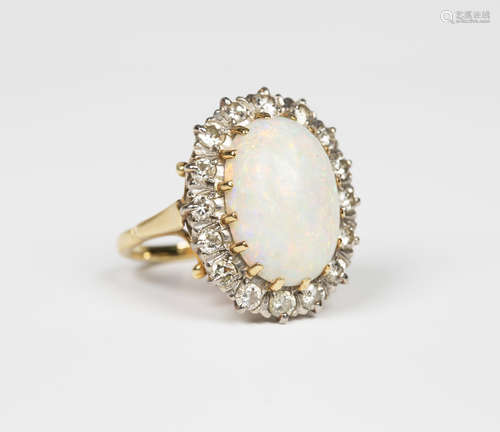 A gold, opal and diamond oval cluster ring, claw set with an oval opal within a surround of circular