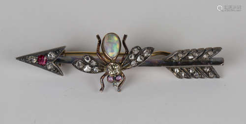 A late Victorian diamond, opal and ruby brooch, circa 1900, designed as a winged insect perched on