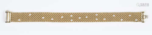 An 18ct gold and diamond bracelet in a multiple link design, collet set with sixteen circular cut