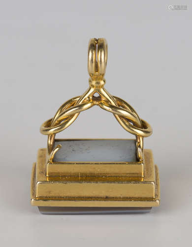 A gold and agate pendant seal, the rectangular agate carved with a blackamoor's head crest above a