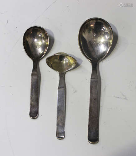 A group of three Danish Art Deco silver serving implements, comprising a pair of graduated serving