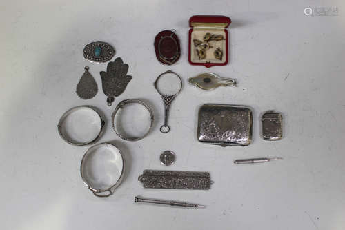 A small group of mostly silver items, including a German .800 silver mounted folding comb with