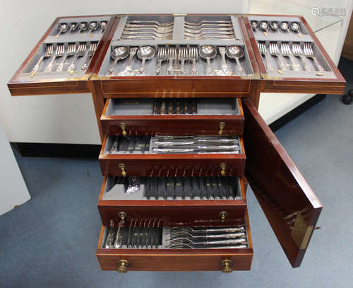 An early 20th century canteen of plated King's pattern cutlery by Thomas Armstrong & Brother,