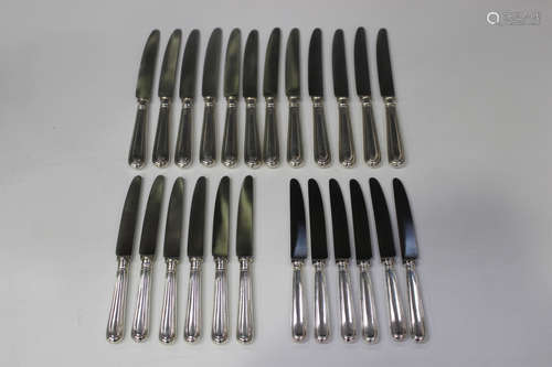 A set of twelve Elizabeth II silver hollow handled Old English Thread pattern table knives and six