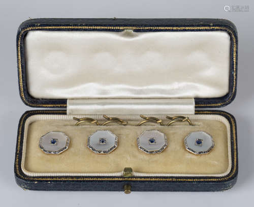 A gold, platinum, sapphire and mother-of-pearl set of four dress buttons, each octagonal front