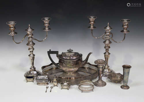 A small group of silver and plated items, including a late Victorian spill vase with scroll