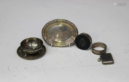 A small group of silver items, including a George V silver and tortoiseshell circular pill box and