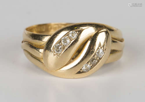 An 18ct gold and diamond ring, designed as a twin headed snake, mounted with two rows of three