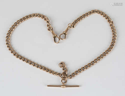 A 9ct gold curblink watch Albert chain, fitted with a 9ct gold T-bar and two 9ct gold swivels,