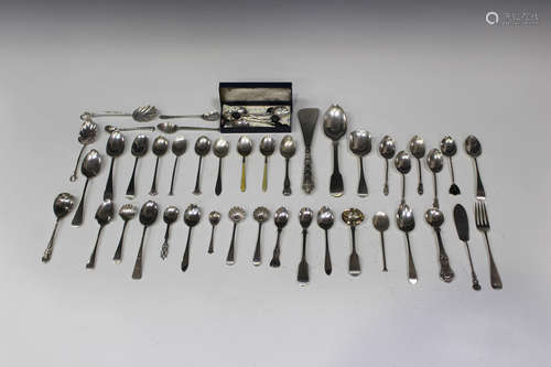 A small group of mostly silver flatware, including a Scottish silver Fiddle pattern mustard spoon,