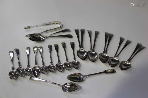 A harlequin set of twelve George III silver dessert spoons, nine London 1806 by Peter & William