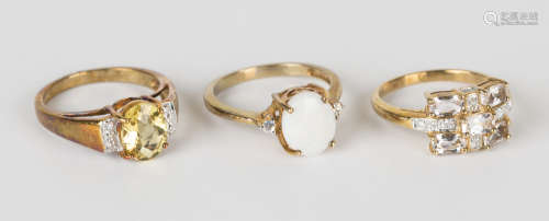A 9ct gold, opal and colourless gem set three stone ring, ring size approx N, and two further 9ct