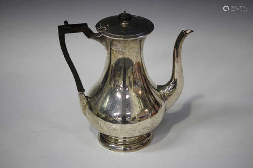 A George V silver coffee pot of baluster form, Sheffield 1912 by John Round & Son Ltd, height 26.