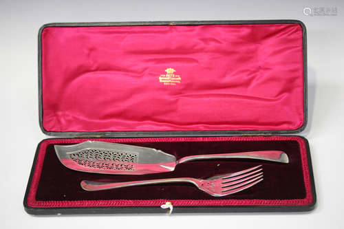 A George IV silver fish slice with pierced blade, London 1825 by William Knight II, length 31cm,