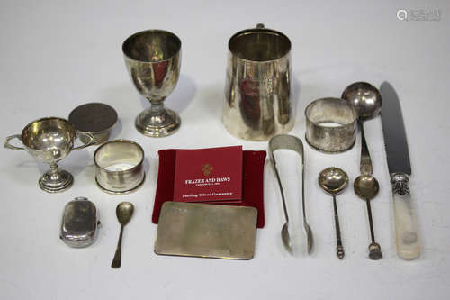 A small group of silver and plated items, including a George V silver christening mug,