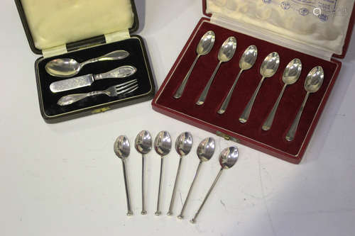 A set of six Elizabeth II silver coffee spoons, each with square section handle and nail terminal,