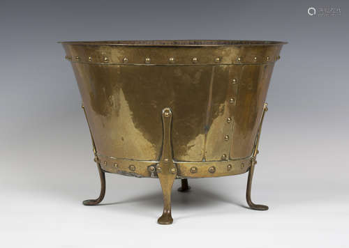 A late Victorian Arts and Crafts brass coal bucket by Birmingham Guild of Handicraft, the tapering