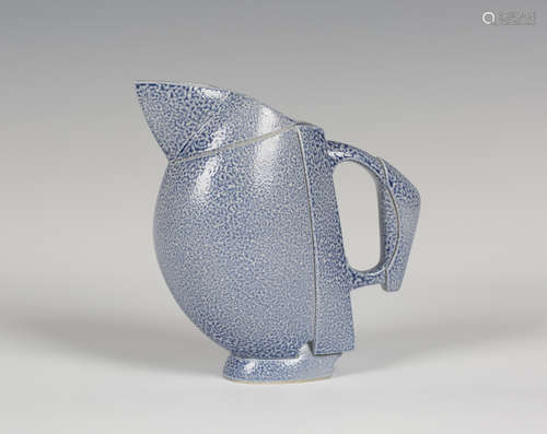 An Anthony Theakston studio pottery stoneware bird jug, covered in a blue speckled glaze, incised