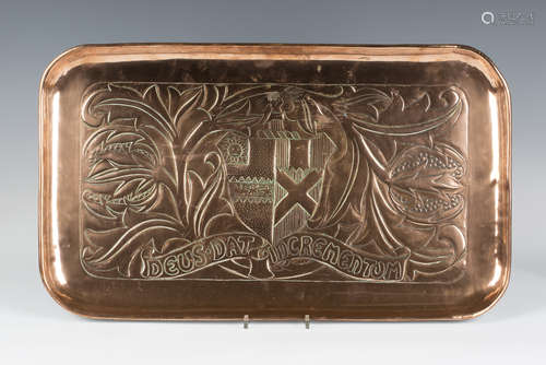 An early 20th century Arts and Crafts rectangular copper tray, probably Newlyn, worked with a