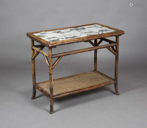 A late 19th century Aesthetic Movement bamboo framed two-tier occasional table, the top inset with