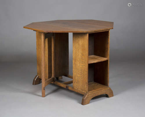 An early 20th century Arts and Crafts oak drop-flap centre table, possibly Cotswold School, the