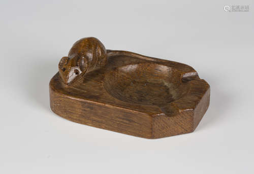 A Robert 'Mouseman' Thompson oak ashtray, the top carved with typical mouse signature, length 10.