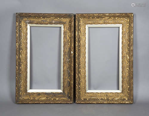 A pair of Art Nouveau gilt composition rectangular frames, each wide section moulded with overall