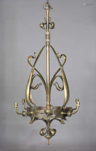 A late Victorian brass four-branch ceiling light, in the manner of W.A.S. Benson, the central stem