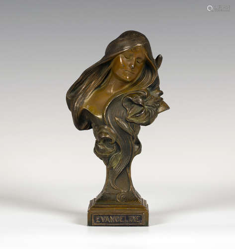 An Art Nouveau patinated cast spelter bust of a young lady, titled 'Evangeline', the stem cast as