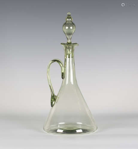 A Powell Whitefriars sea green tinted glass claret jug and stopper, originally designed 1880s, the