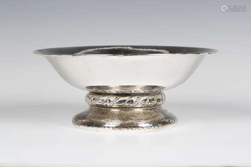 A George V Liberty & Co 'Cymric' silver bowl, model number '50221', the hammered circular body