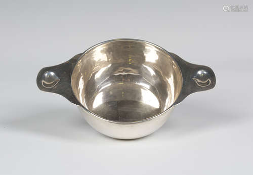 A George VI Liberty & Co 'Cymric' silver two-handled bowl, model number '5778', the hammered