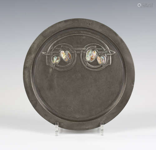 A Liberty & Co 'Tudric' pewter circular card tray, designed by Archibald Knox, model number '