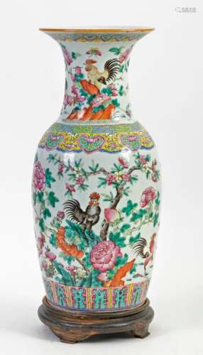China, 19th century Polychrome porcelain balustervase decorated with flowering branches with roostersH: 44 cm (excluding the restored wooden base)(hair under the base)